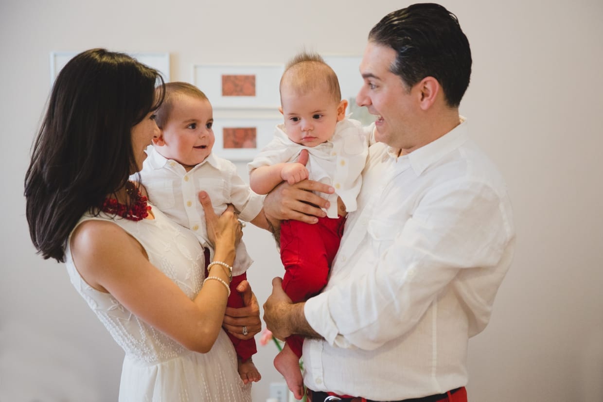 A candid and natural family portrait during a Boston family photo session at home. 