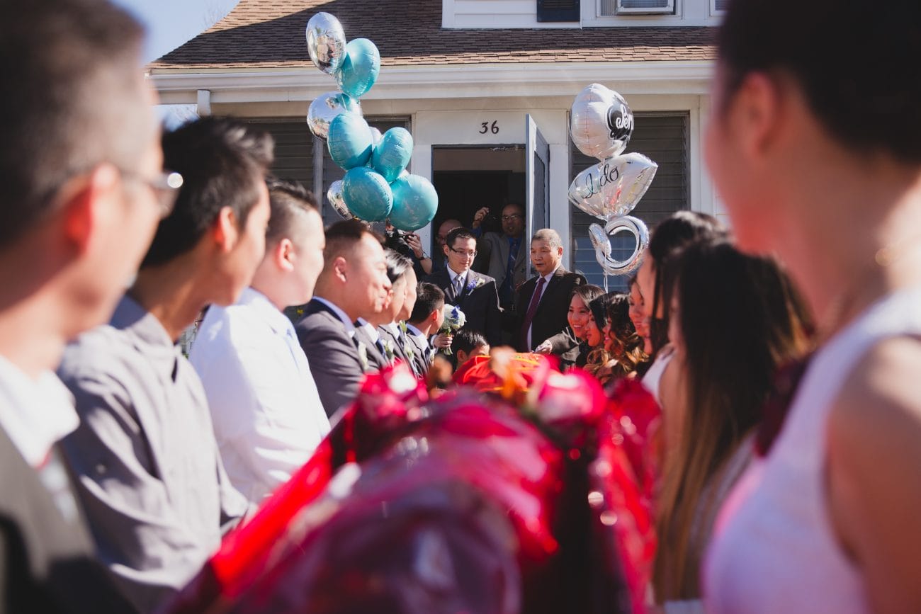 A documentary style photograph of a vietnamese tea ceremony in a Boston family home