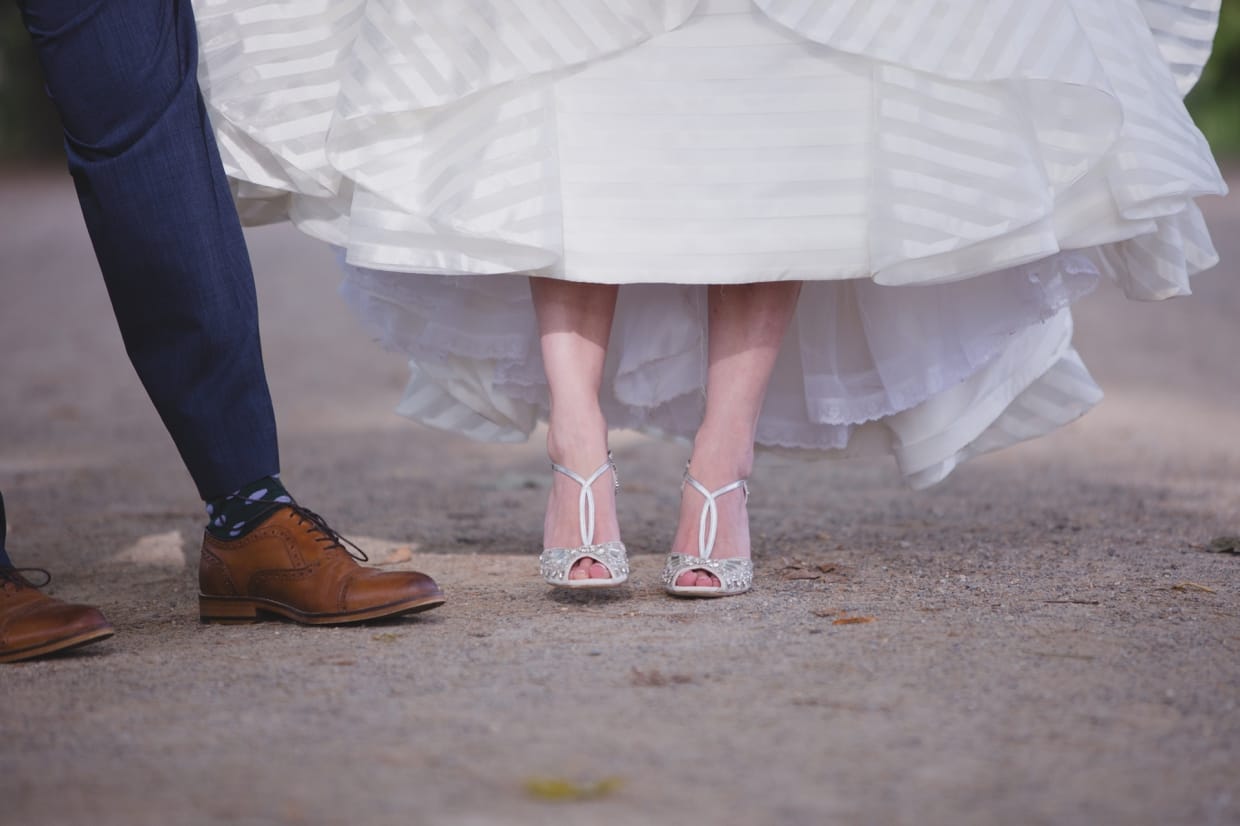 A artistic photograph of a bride's emmy london cinderella shoes