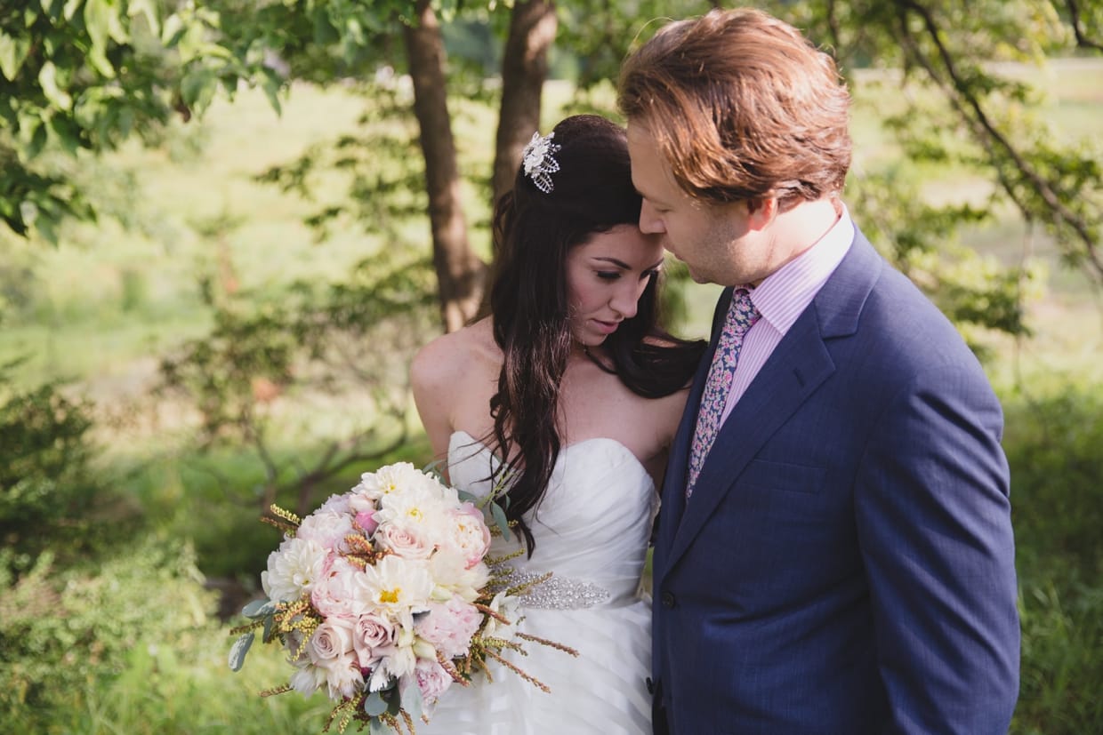 A sweet and romantic wedding portrait at Minute Man Park in Massachusetts