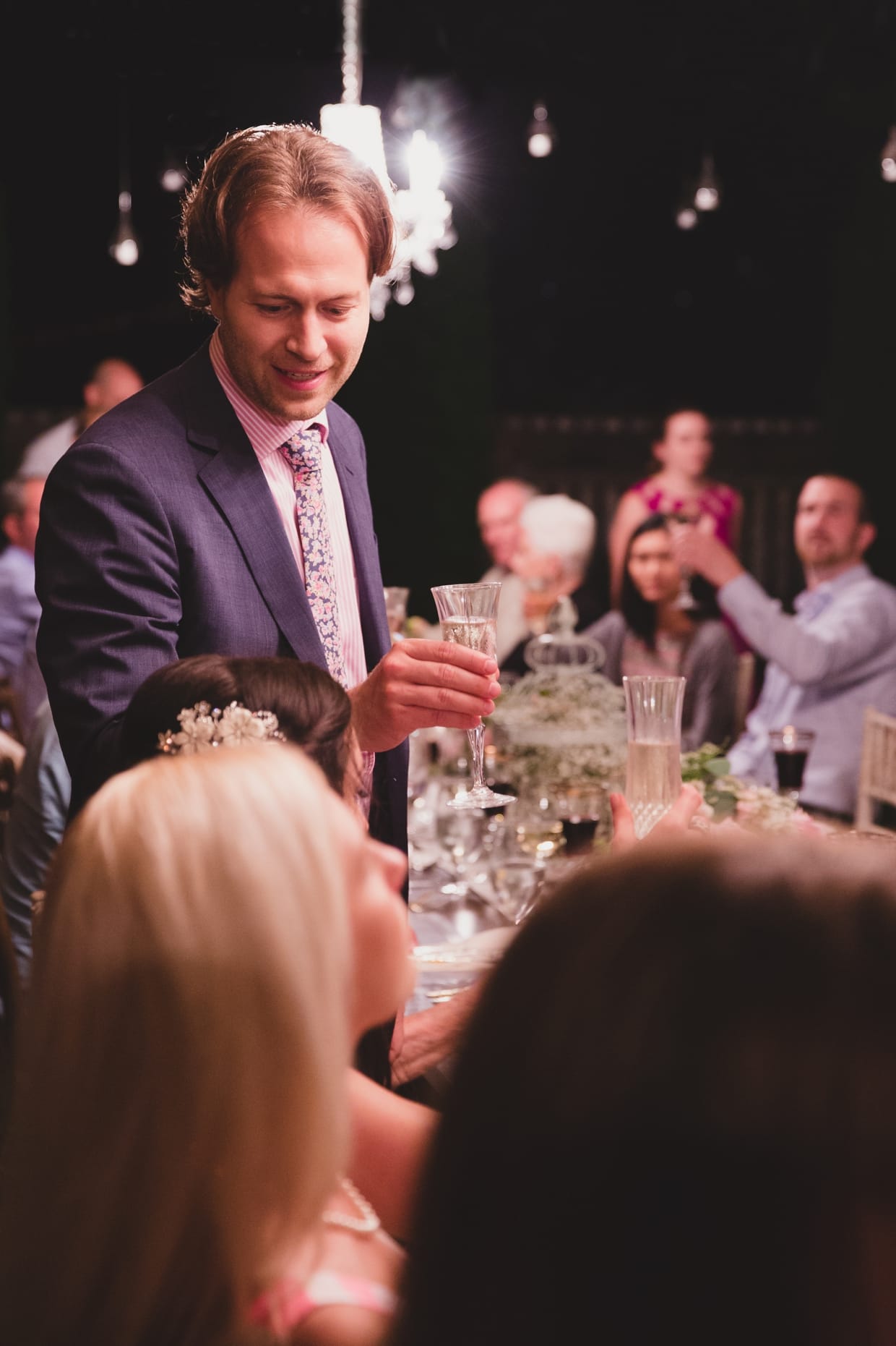 A groom gives a heartfelt toast at his backyard wedding in Massachusetts