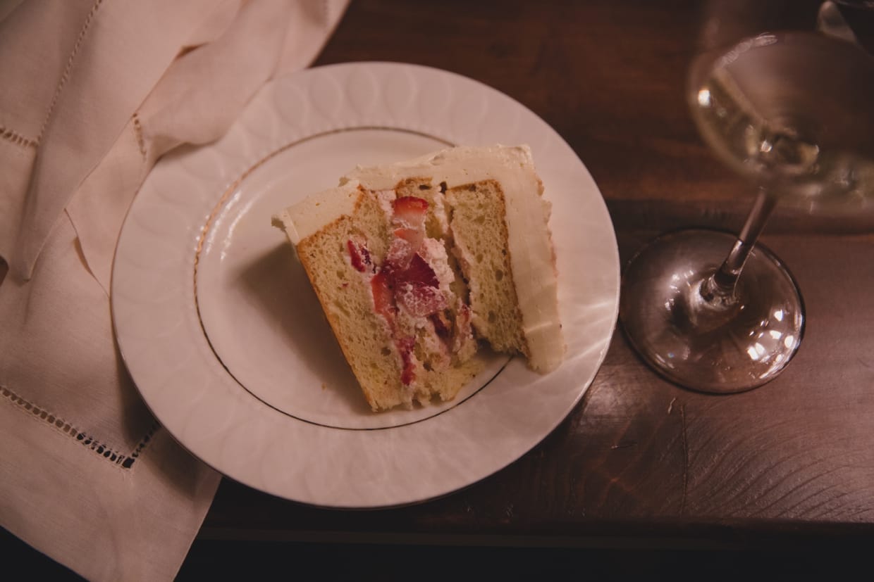 A detailed photograph of a piece of cake at a backyard wedding in Massachusetts