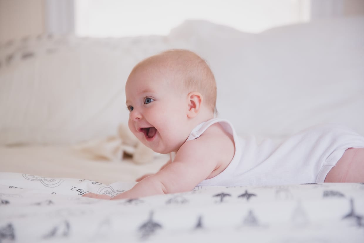 A beautiful and sweet photograph of a baby girl during an in home family photo session in Boston