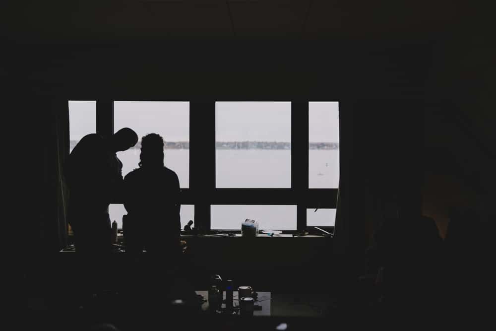 A documentary photograph of a bride getting ready at Hyatt Regency Hotel before her wedding at the Castle Hill Inn in Newport, Rhode Island