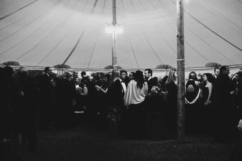 A documentary photograph of cocktail hour at a Castle Hill Inn Wedding in Newport, Rhode Island