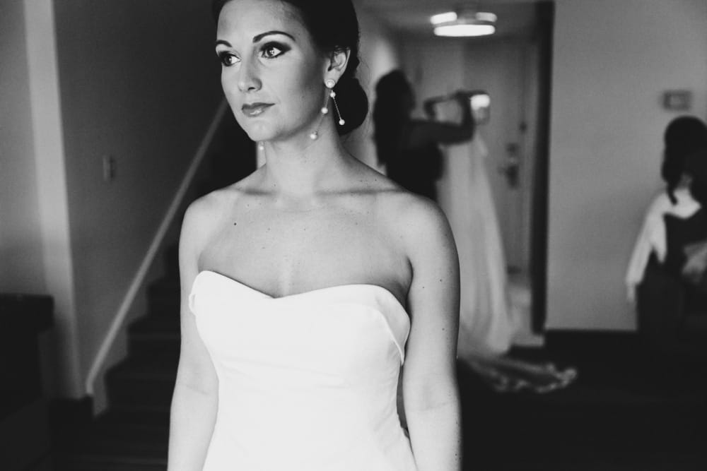 A documentary photograph of a bride getting ready at the Hyatt Regency Hotel before her wedding at the Castle Hill Inn in Newport, Rhode Island