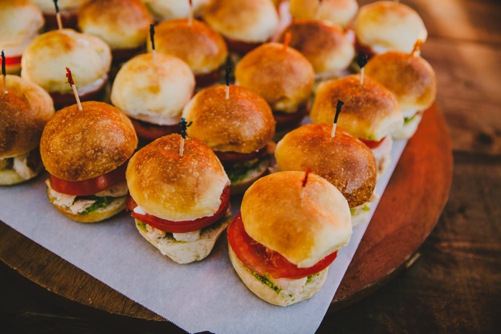A photojournalistic photograph of rustic artisan food being served during cocktail hour during a New Hampshire Wedding at Kitz Farm