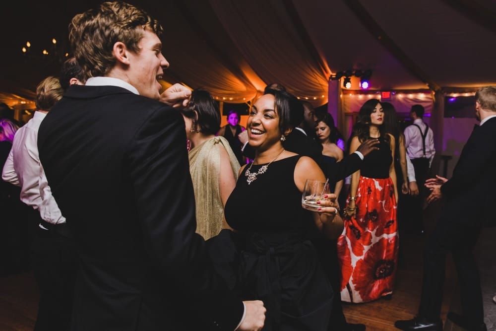 A photojournalistic photograph of a couple dancing at a Castle Hill Inn Wedding in Newport, Rhode Island