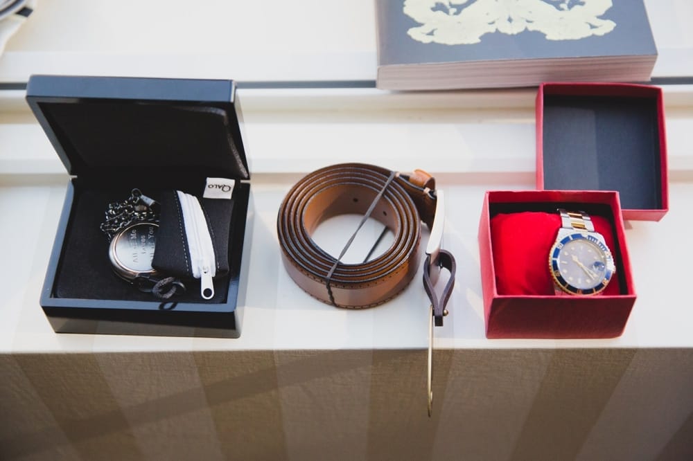 A detailed photograph of the groom's accessories on the morning of his State Room Wedding in Boston