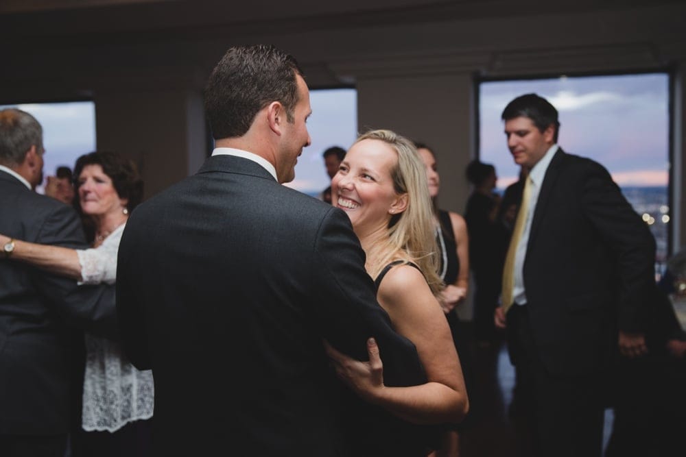 A documentary photograph of a couple dancing during a State Room Wedding in Boston