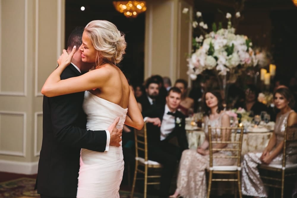 A documentary photograph of a bride and groom sharing their dance at their Taj Boston Hotel Wedding in Massachusetts