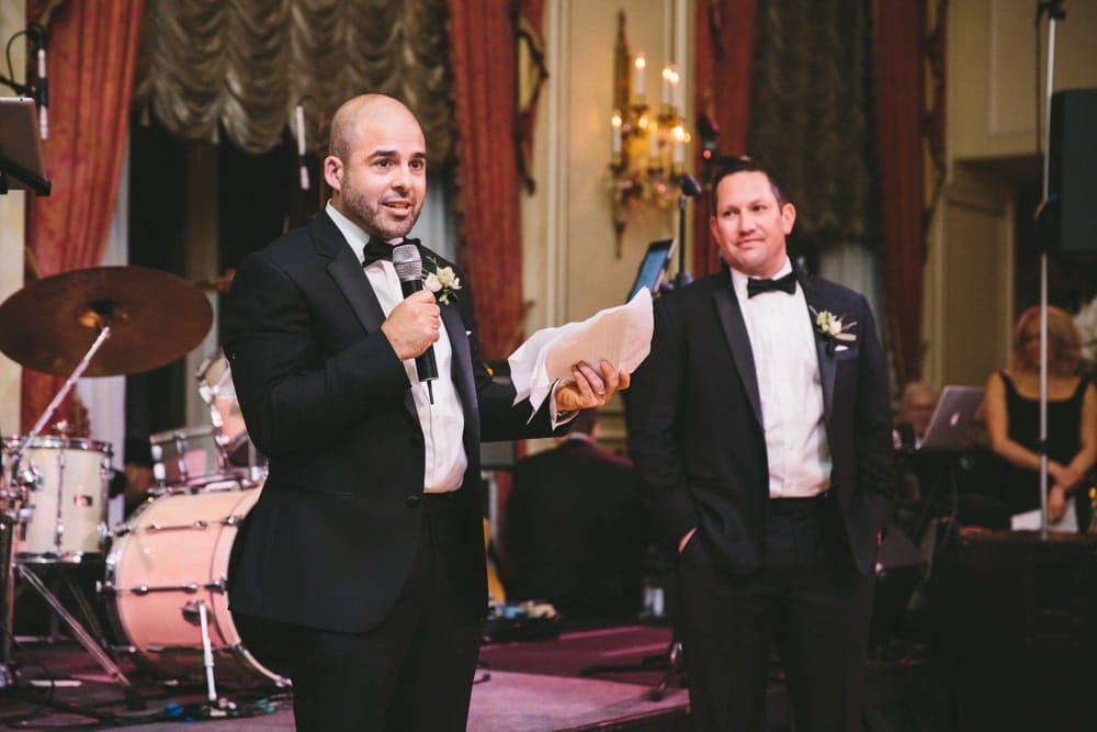A documentary photograph of a best man giving his speech during a Taj Boston Hotel Wedding in Massachusetts