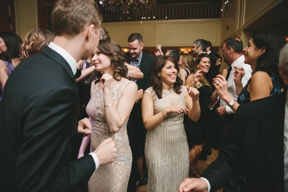 A documentary photograph of guests dancing during a Taj Boston Hotel Wedding in Massachusetts