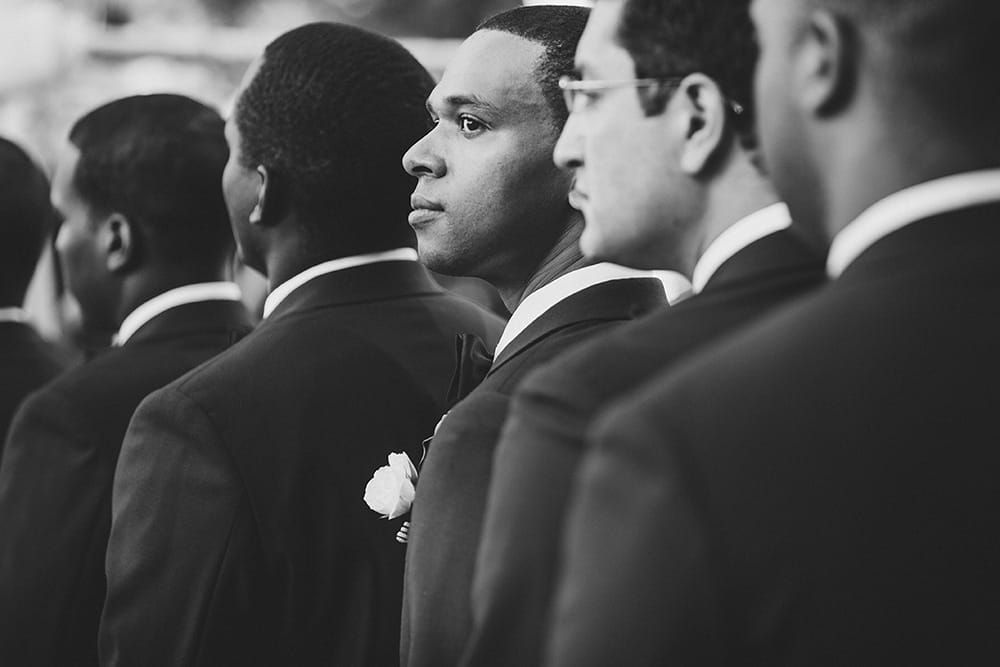 A documentary photograph of Groomsmen during a wedding ceremony on Martha's Vineyard