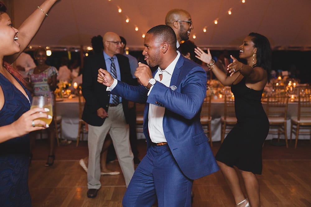 A documentary photograph of guests dancing at a Martha's Vineyard Wedding