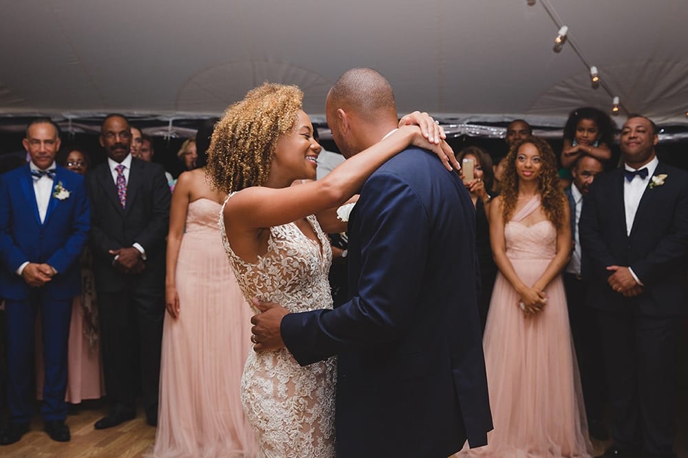 A documentary photograph of a bride and groom dancing at their Martha's Vineyard Wedding