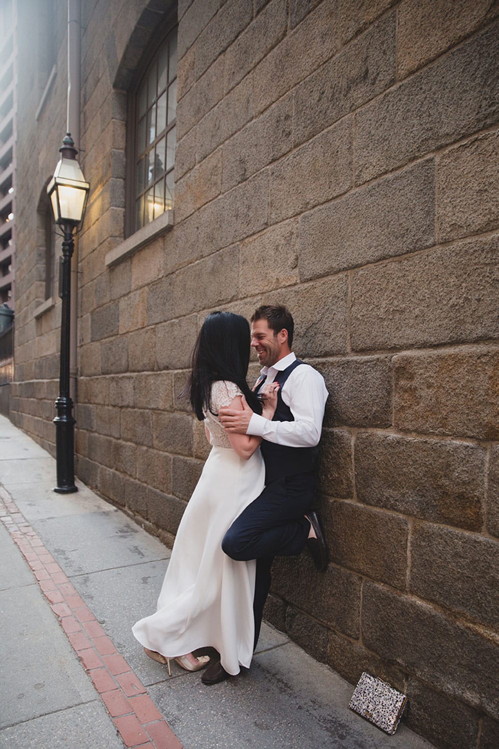 A relaxed portrait of a couple in the city during their Boston Engagement Session