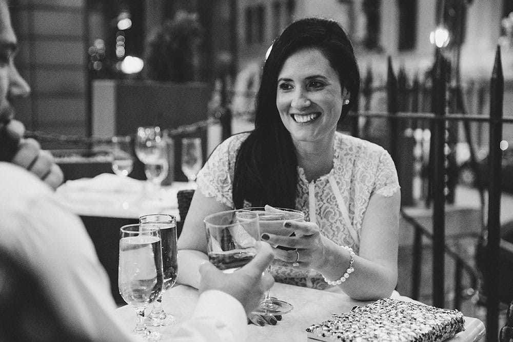 A documentary photograph of a couple having a cocktail at Marliave Restaurant during their Boston Engagement Session