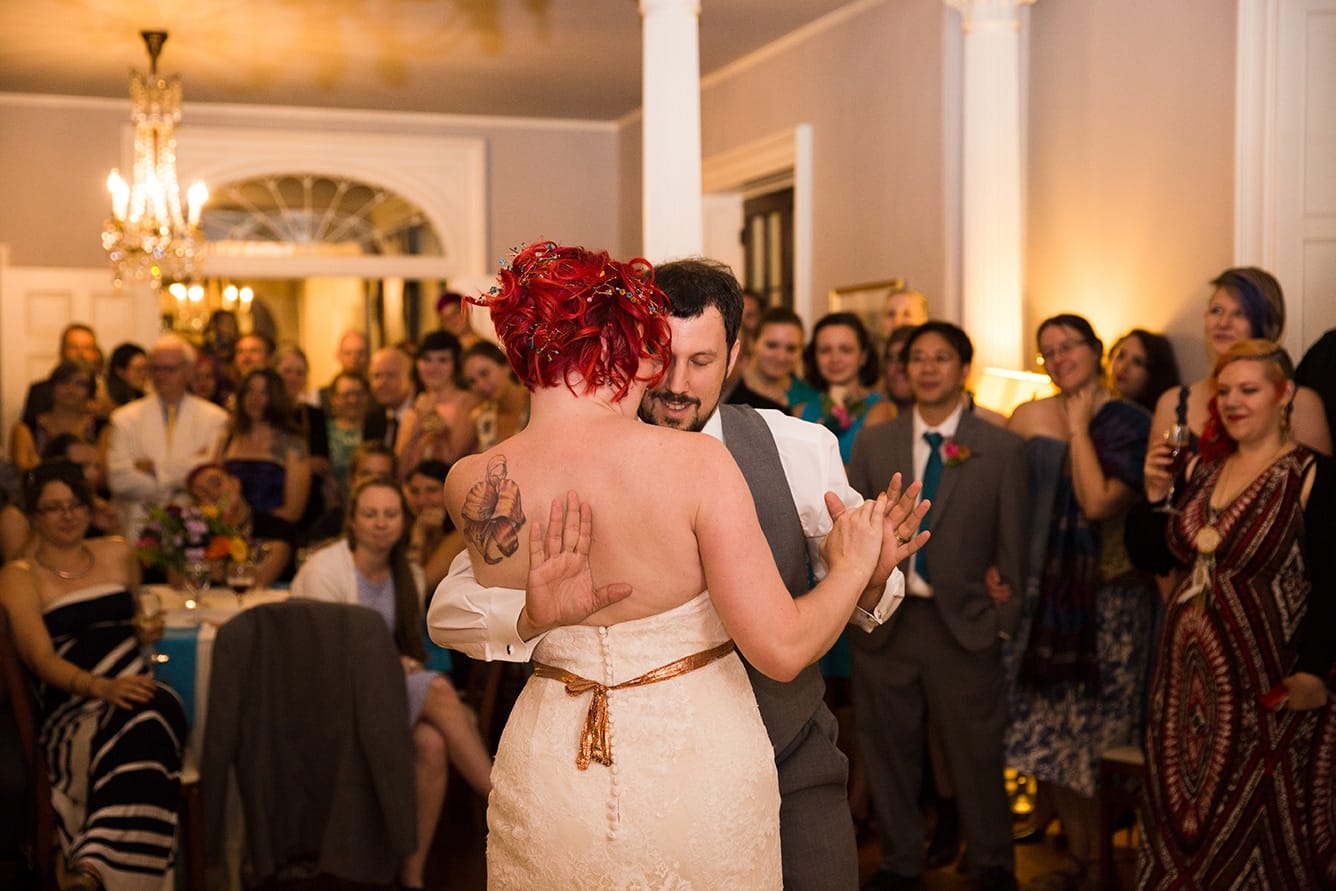 A documentary photograph of a bride and groom having their first dance at their Lyman Estate Wedding in Boston, Massachusetts
