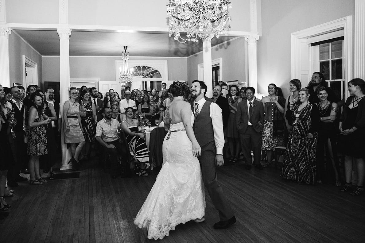 A documentary photograph of a bride and groom having their first dance at a Lyman Estate Wedding in Boston, Massachusetts