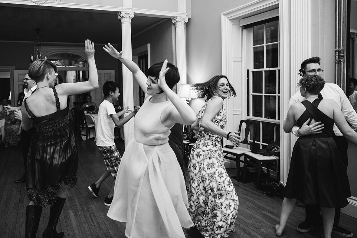 A documentary photograph of guests dancing during a Lyman Estate Wedding in Boston, Massachusetts