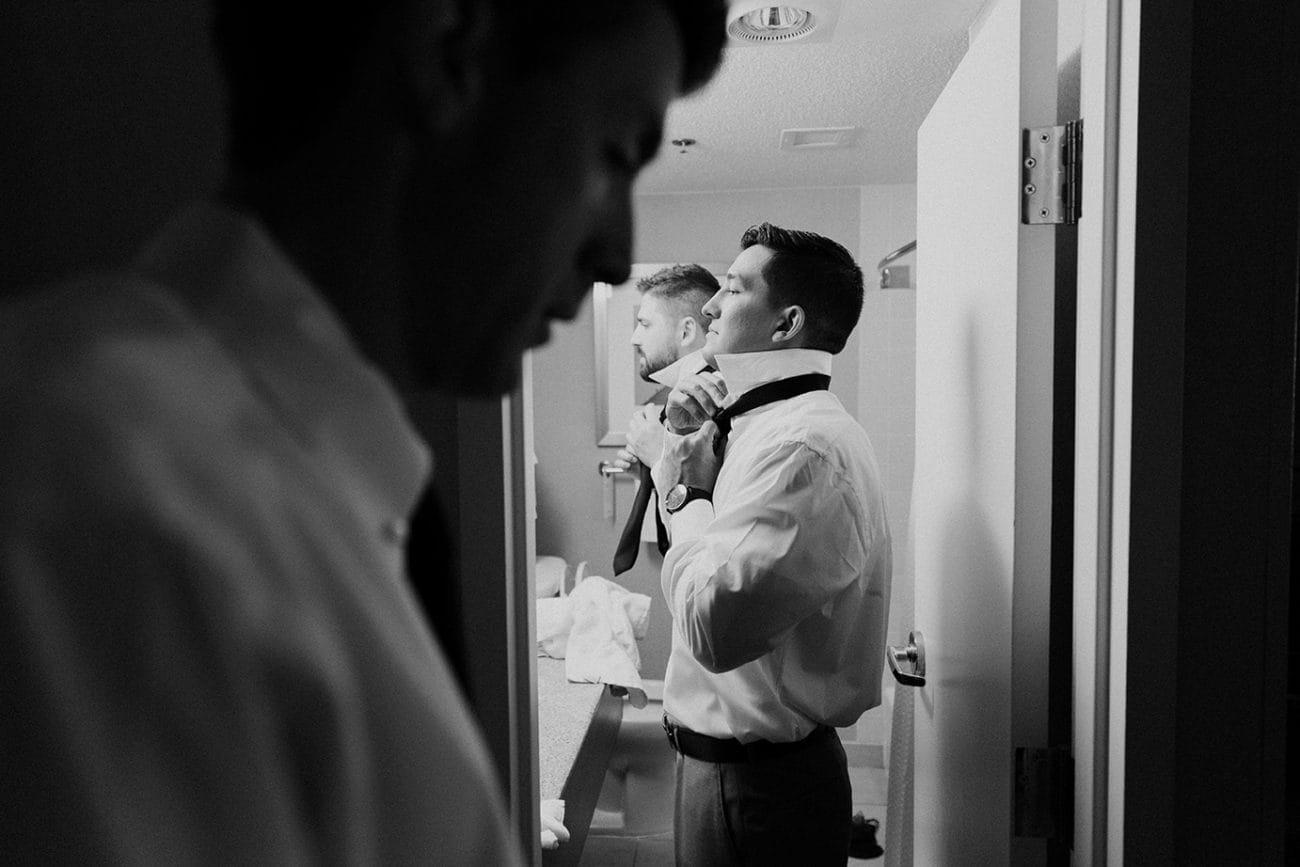 This documentary photograph of groomsmen getting ready is one of the best wedding photographs of 2016