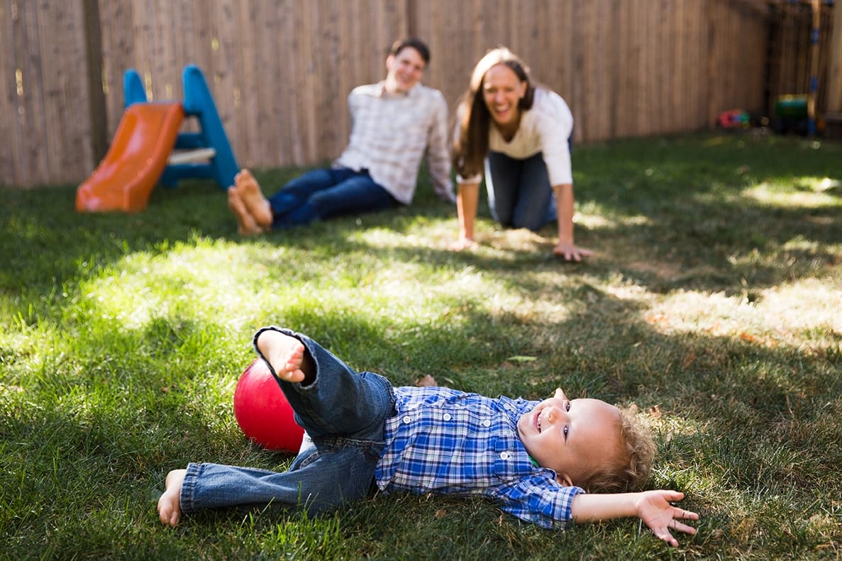 This documentary photograph of a family playing in their backyard is one of the best family photographs of 2016