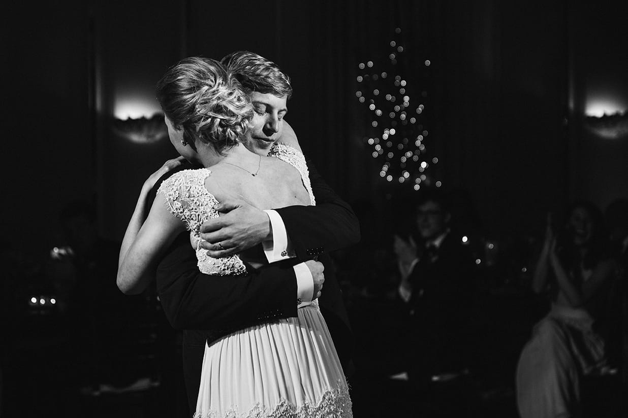 This documentary photograph of a bride and groom sharing their first dance is one of the best wedding photographs of 2016