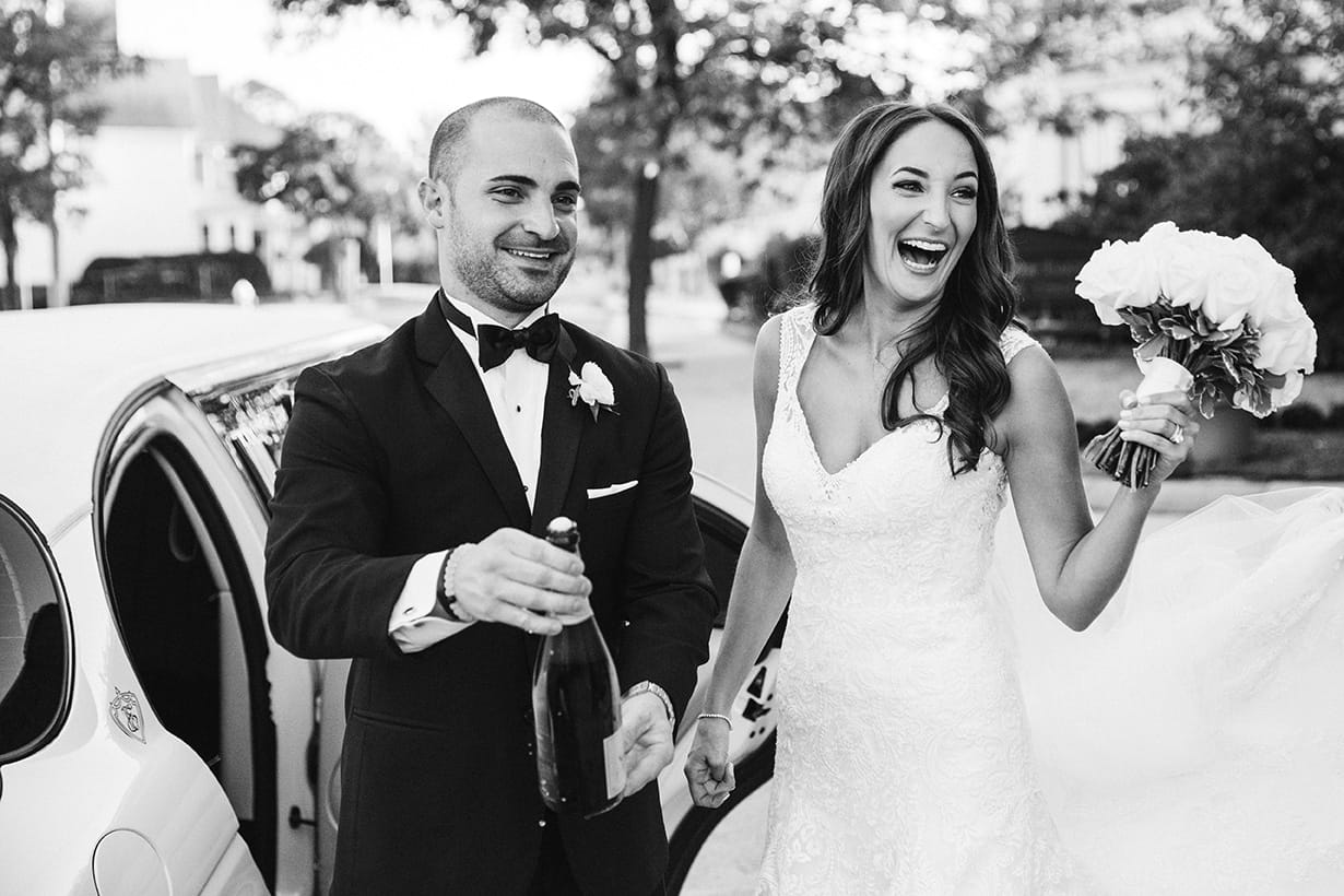 This documentary photograph of a couple celebrating after their wedding ceremony is one of the best wedding photograph of 2016