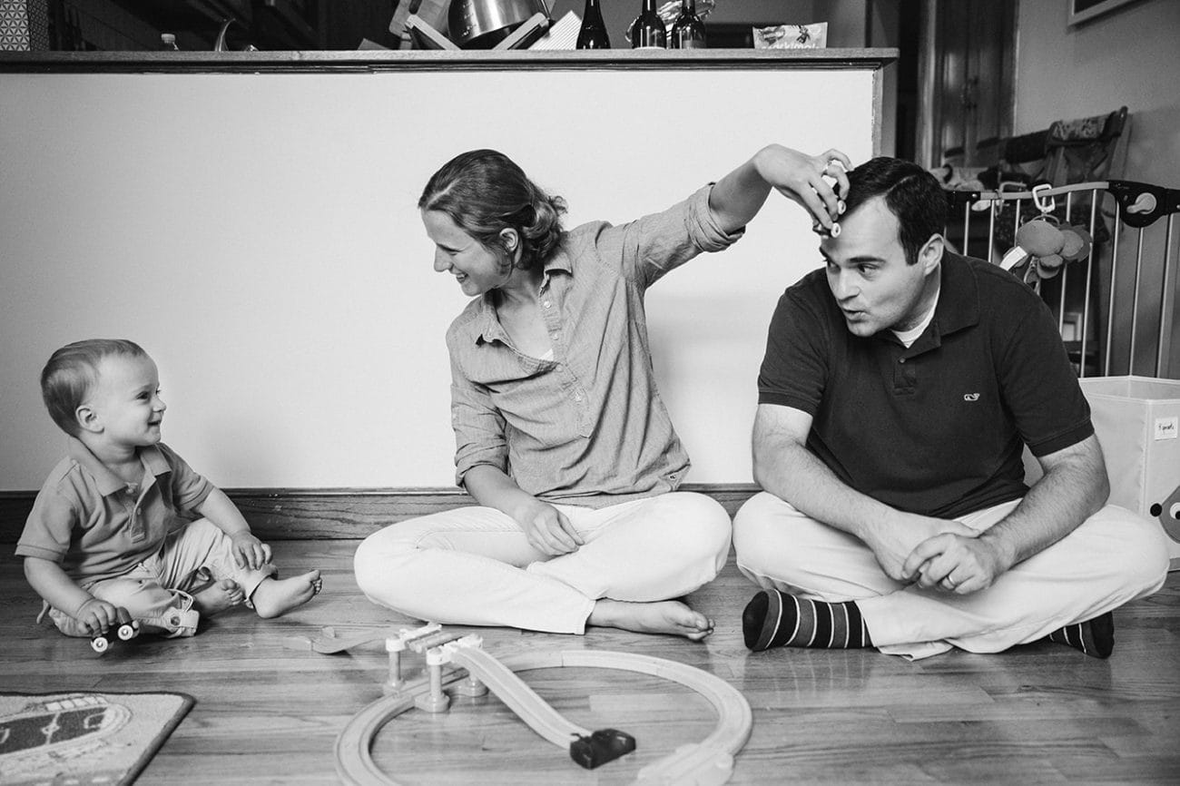 This documentary photograph of a family hanging out in the living room is one of the best family photographs of 2016