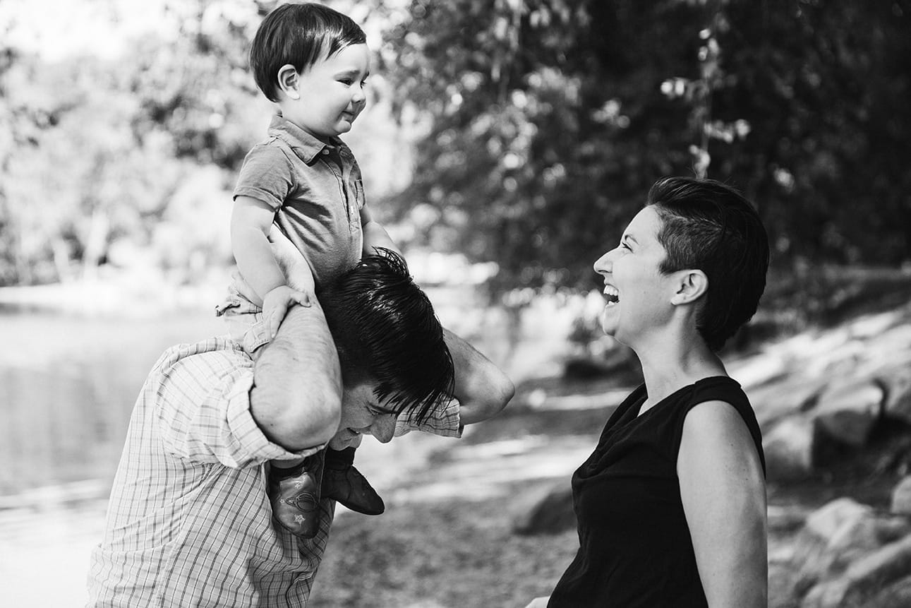 This documentary photograph of a family laughing at Jamaica Pond is one of the best family photographs of 2016
