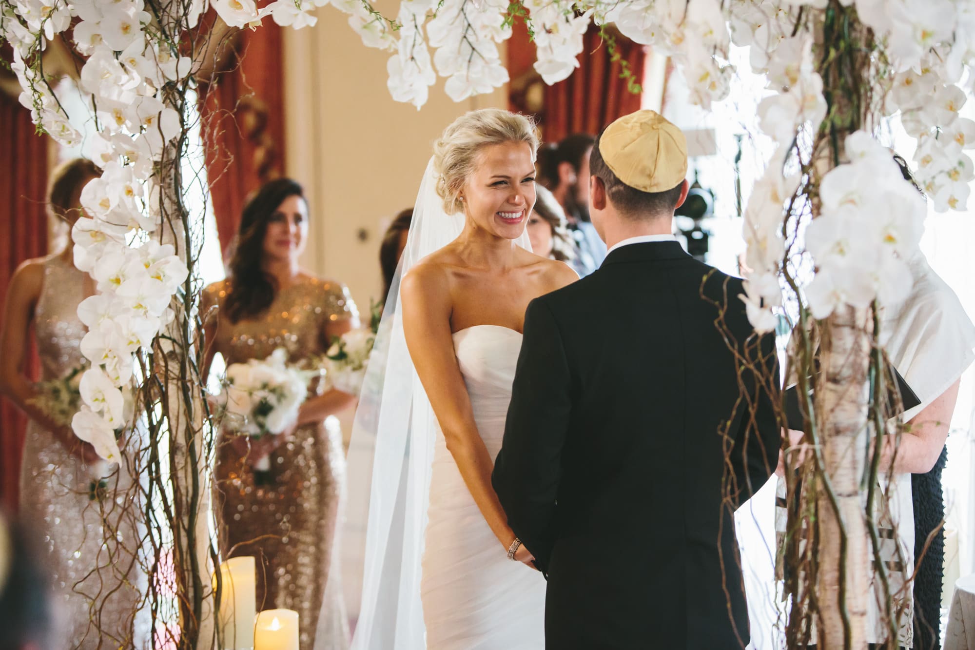 This documentary photograph of a bride and groom during their Taj Boston Wedding ceremony is one of the best wedding photographs of 2016