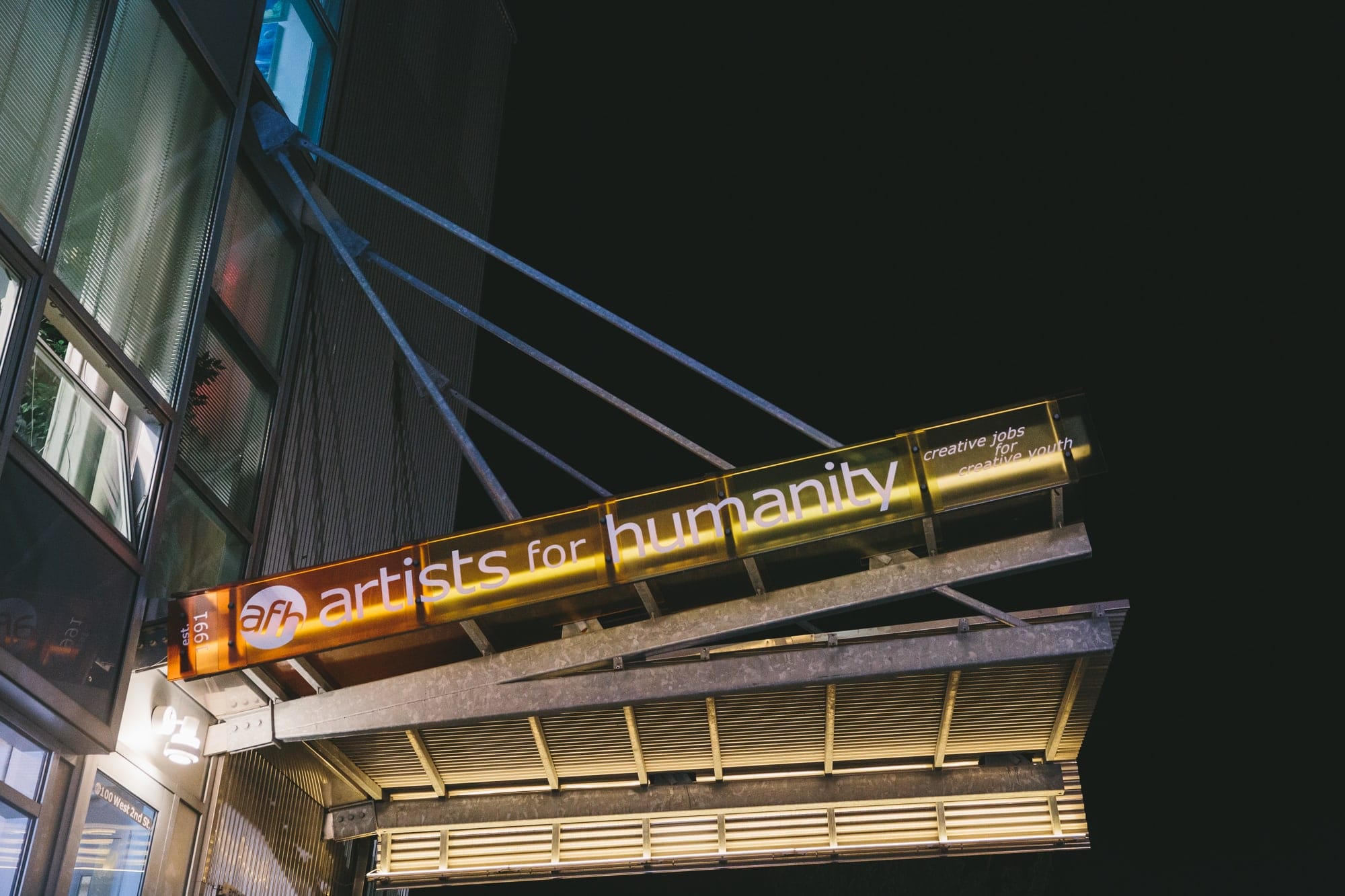 A photograph of Artists for Humanity entrance at night during a wedding