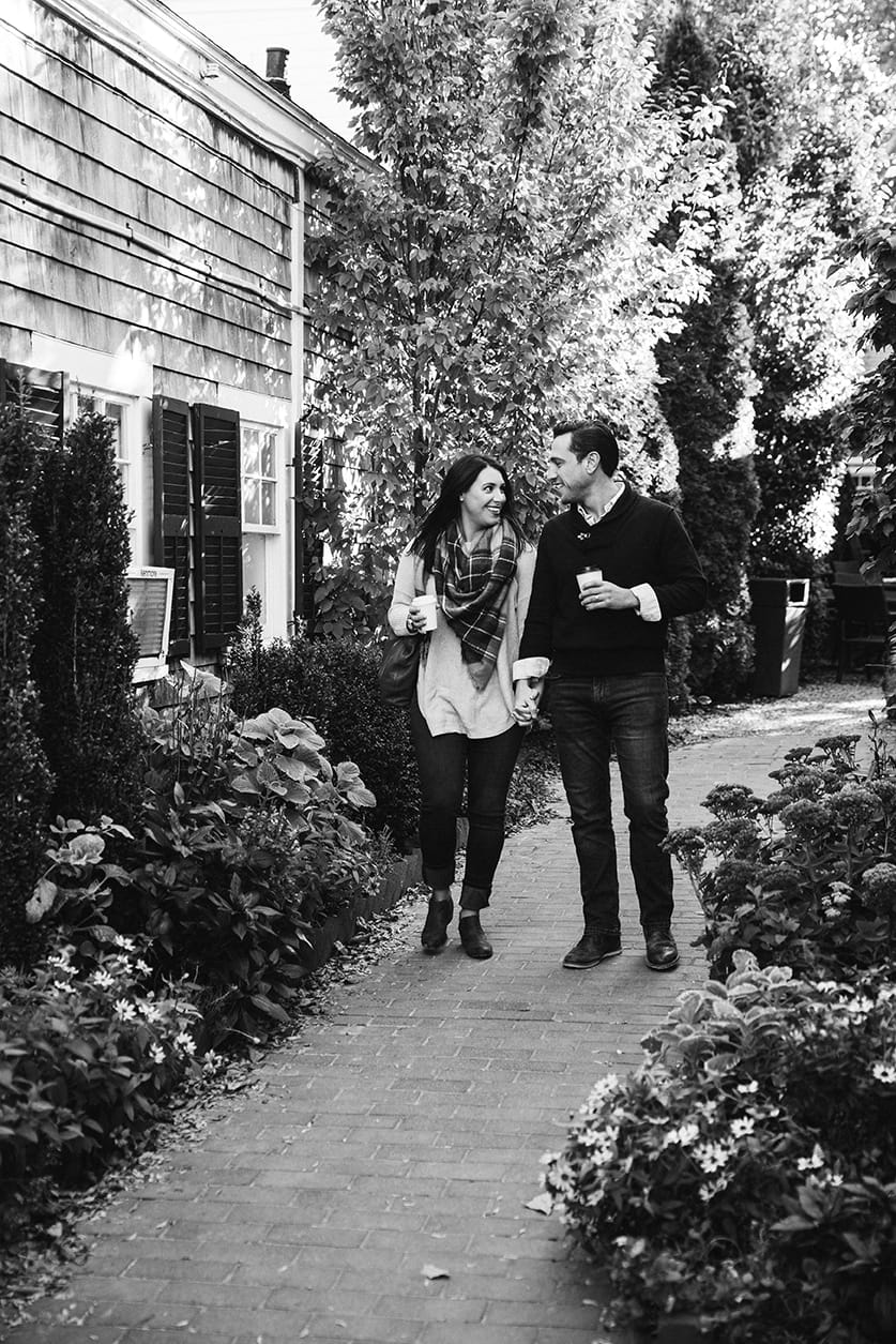 A documentary photograph of a couple walking together during their honeymoon photo session on Martha's Vineyard