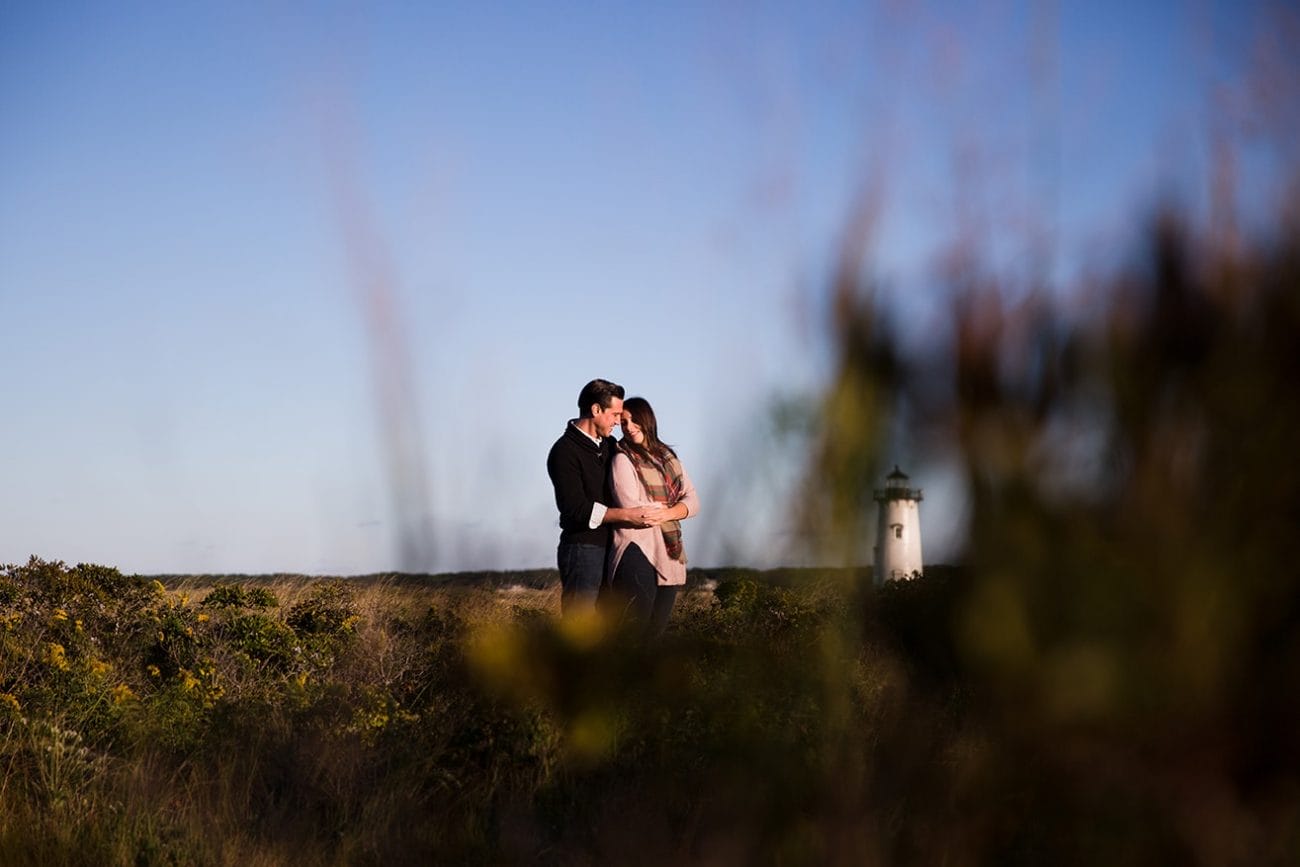 A documentary photograph of a couple hugging during their honeymoon photo session on Martha's Vineyard
