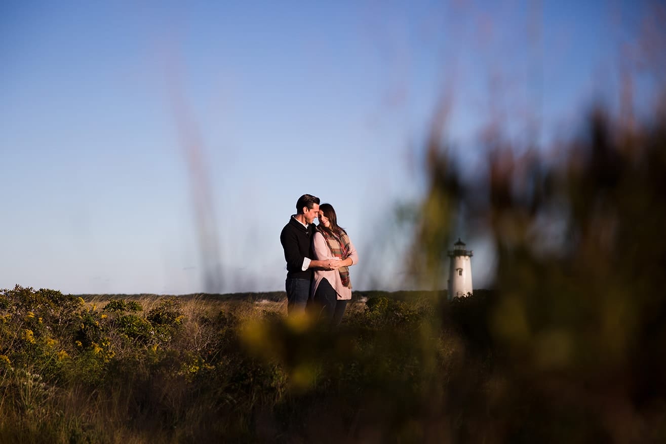A documentary photograph of a couple hugging during their honeymoon photo session on Martha's Vineyard