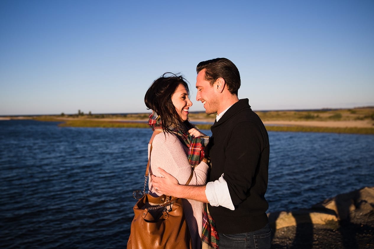 A documentary photo session of a couple hugging during their honeymoon photo session on Martha's Vineyard
