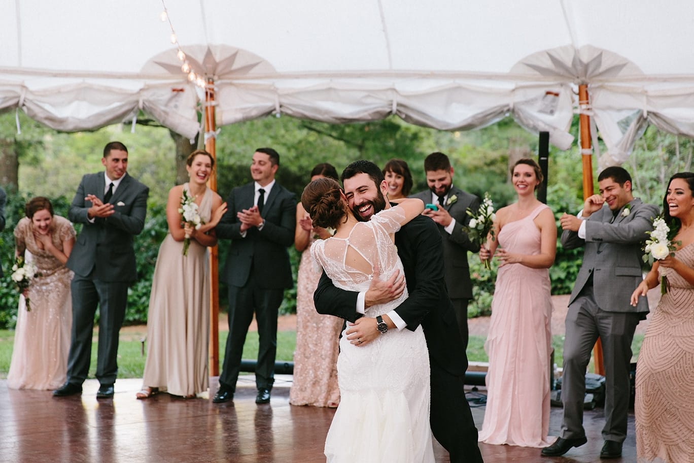 A documentary photograph of a bride and groom having their first dance at their Moraine Farm Wedding in Beverly, Massachusetts