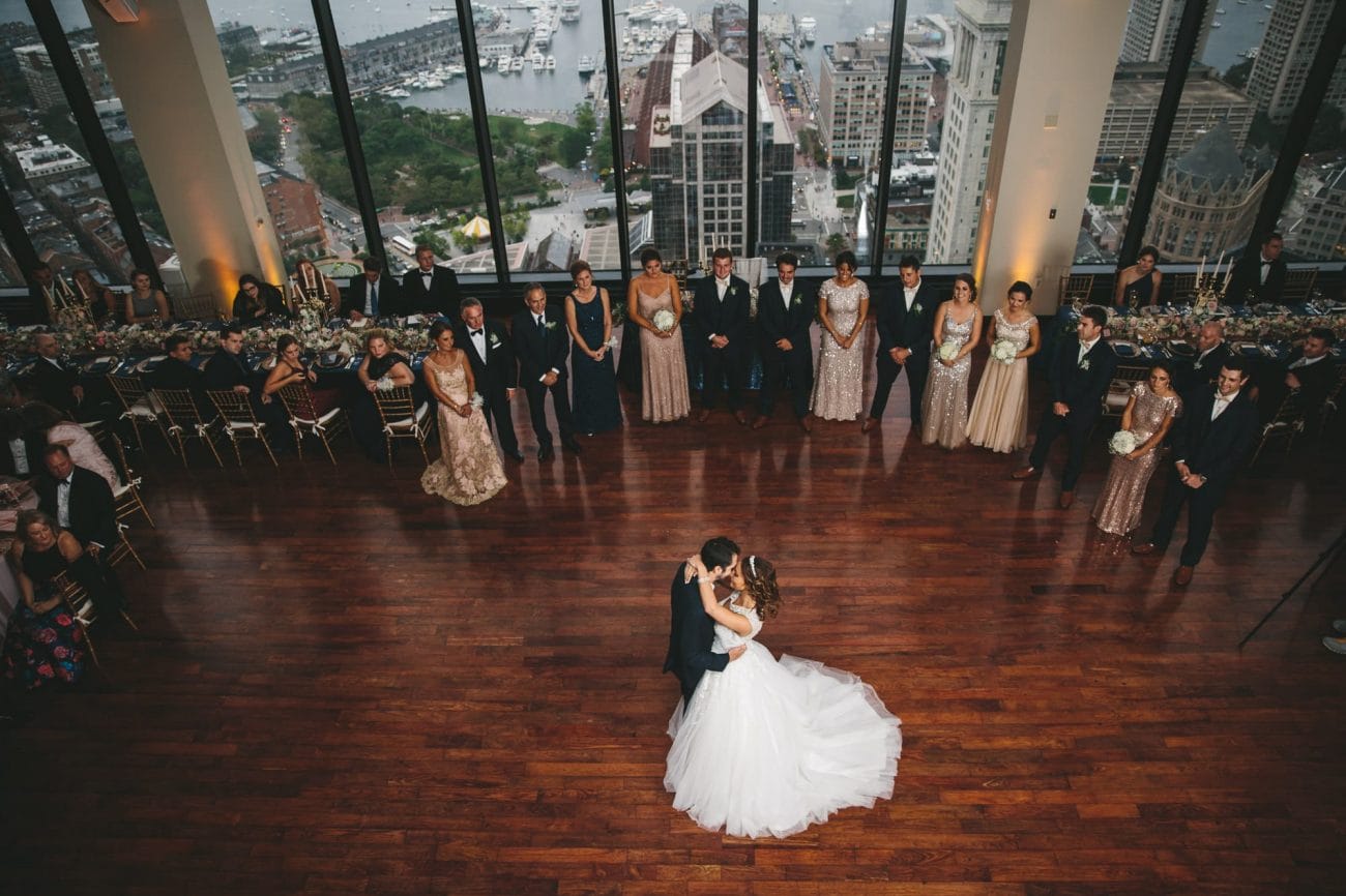 A documentary photograph of a couple sharing their first dance during their State Room Wedding in Boston, Massachusetts
