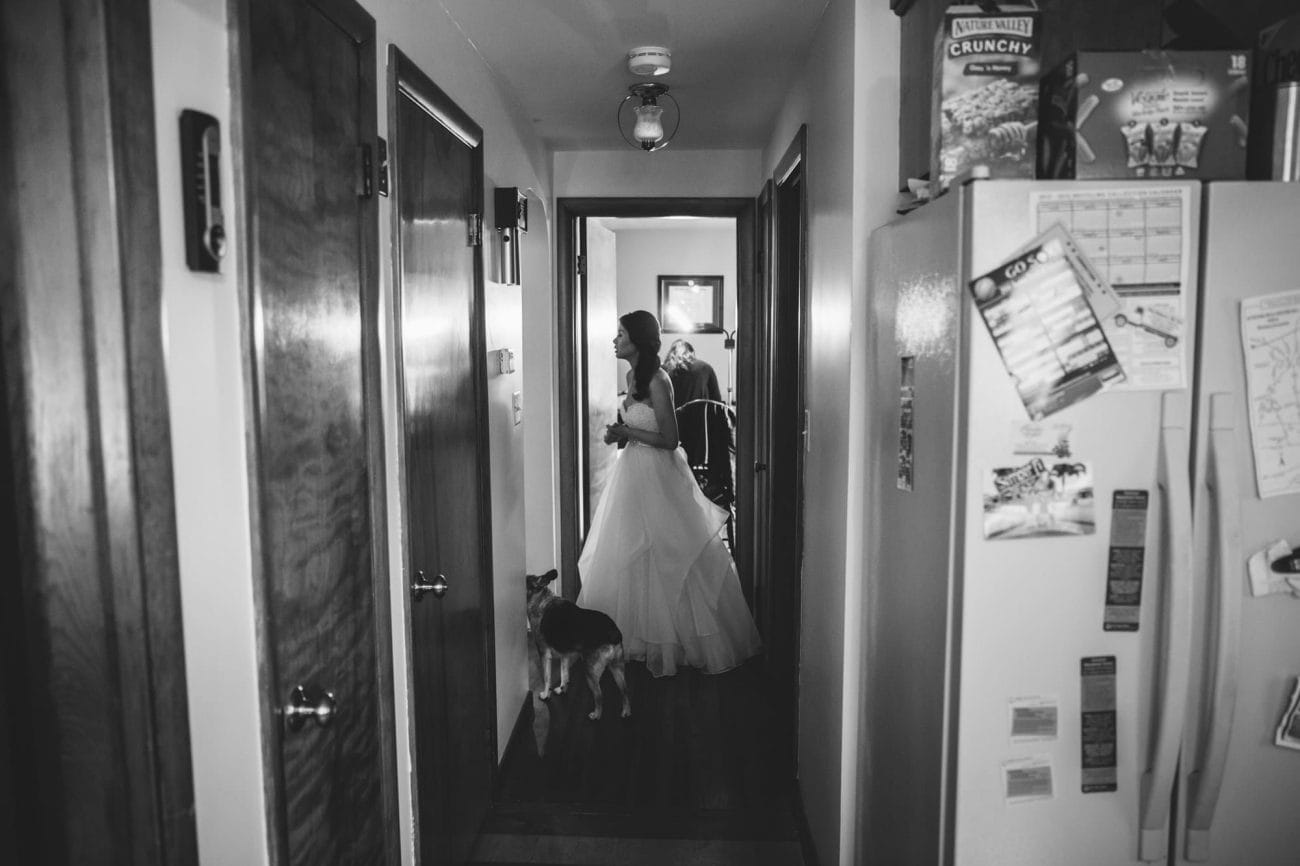 A documentary photograph of a bride getting ready for her tower hill wedding in Boylston, Massachusetts