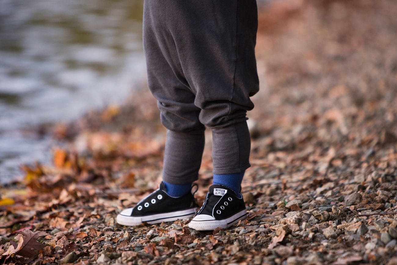 A detailed photograph of a toddler's shoes during a Jamaica Pond family photo session in Boston