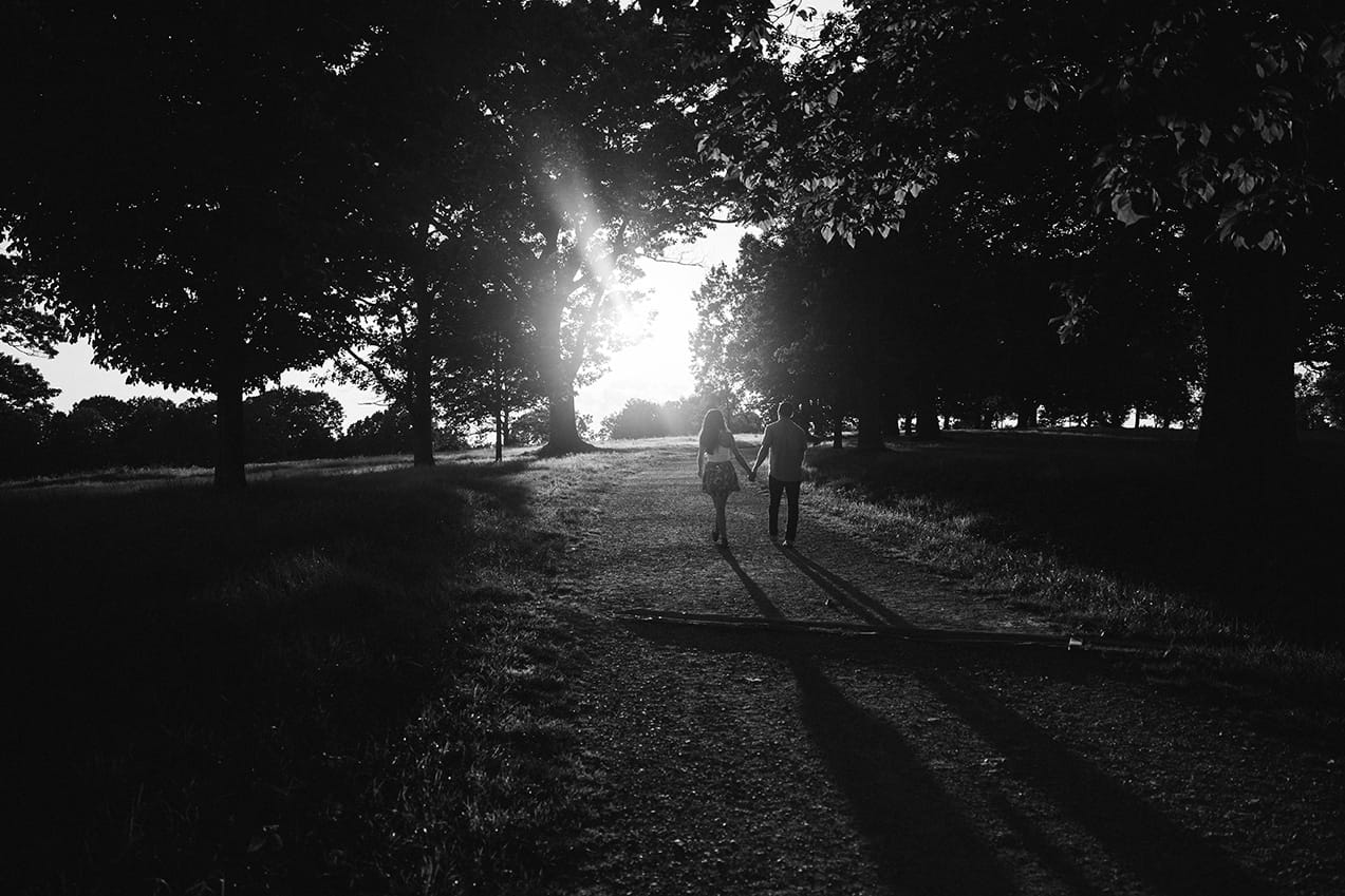 A documentary portrait of a couple walking together during their World's End Engagement Session in Hingham, Massachusetts