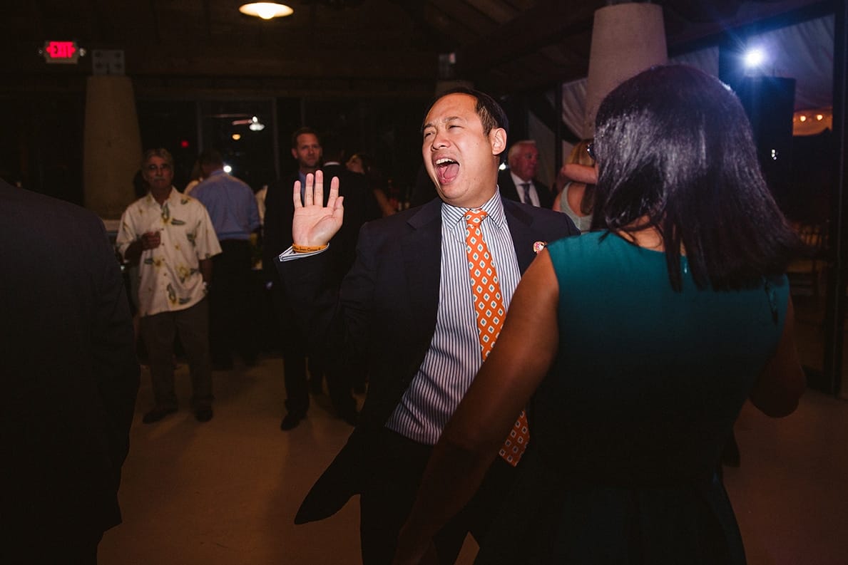 A documentary photograph of guests dancing at a plimoth plantation wedding in plymouth, massachusetts