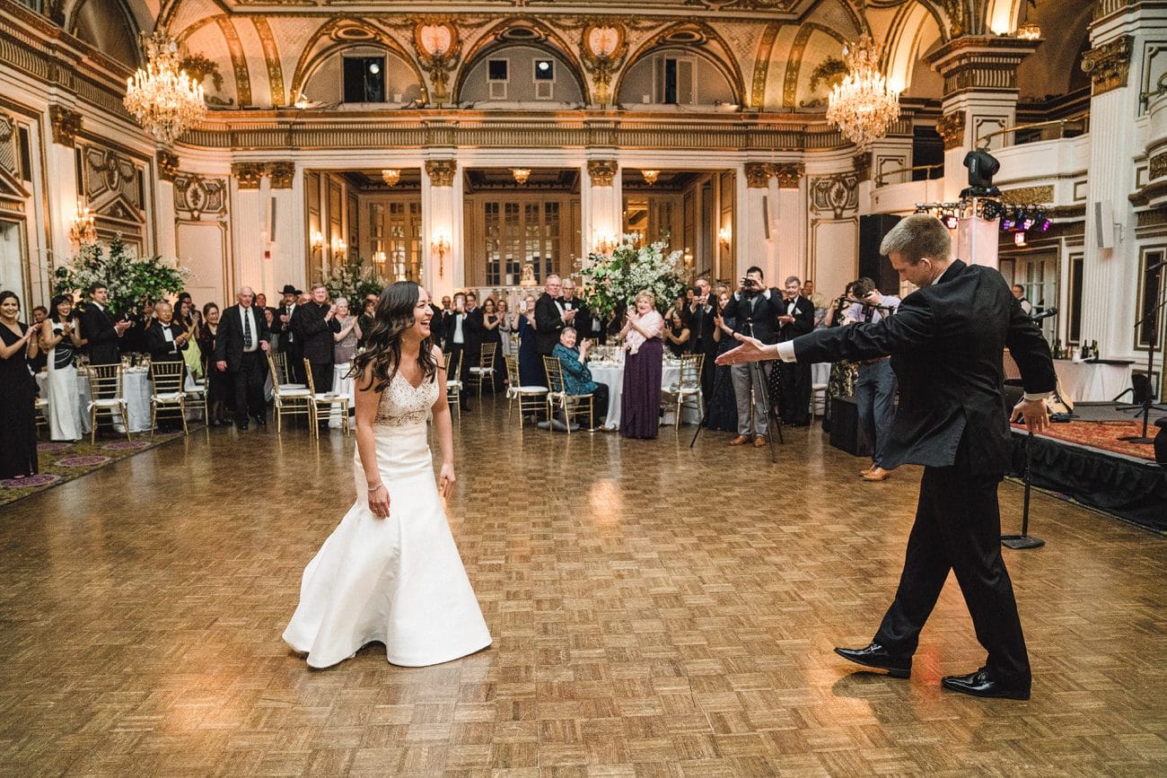 A documentary photograph of the bride and grooms first dance at their fairmont copley wedding