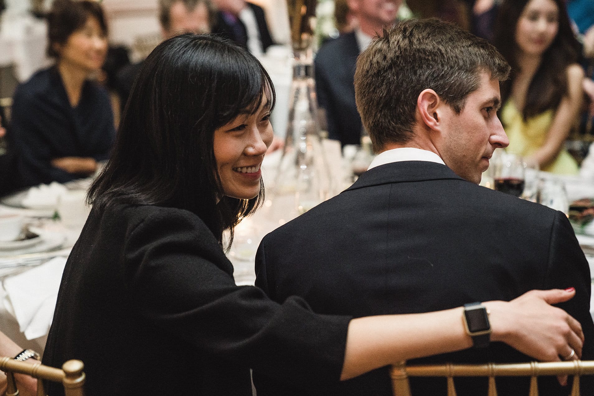 A documentary photograph of the funny and warm toasts at a fairmont copley wedding