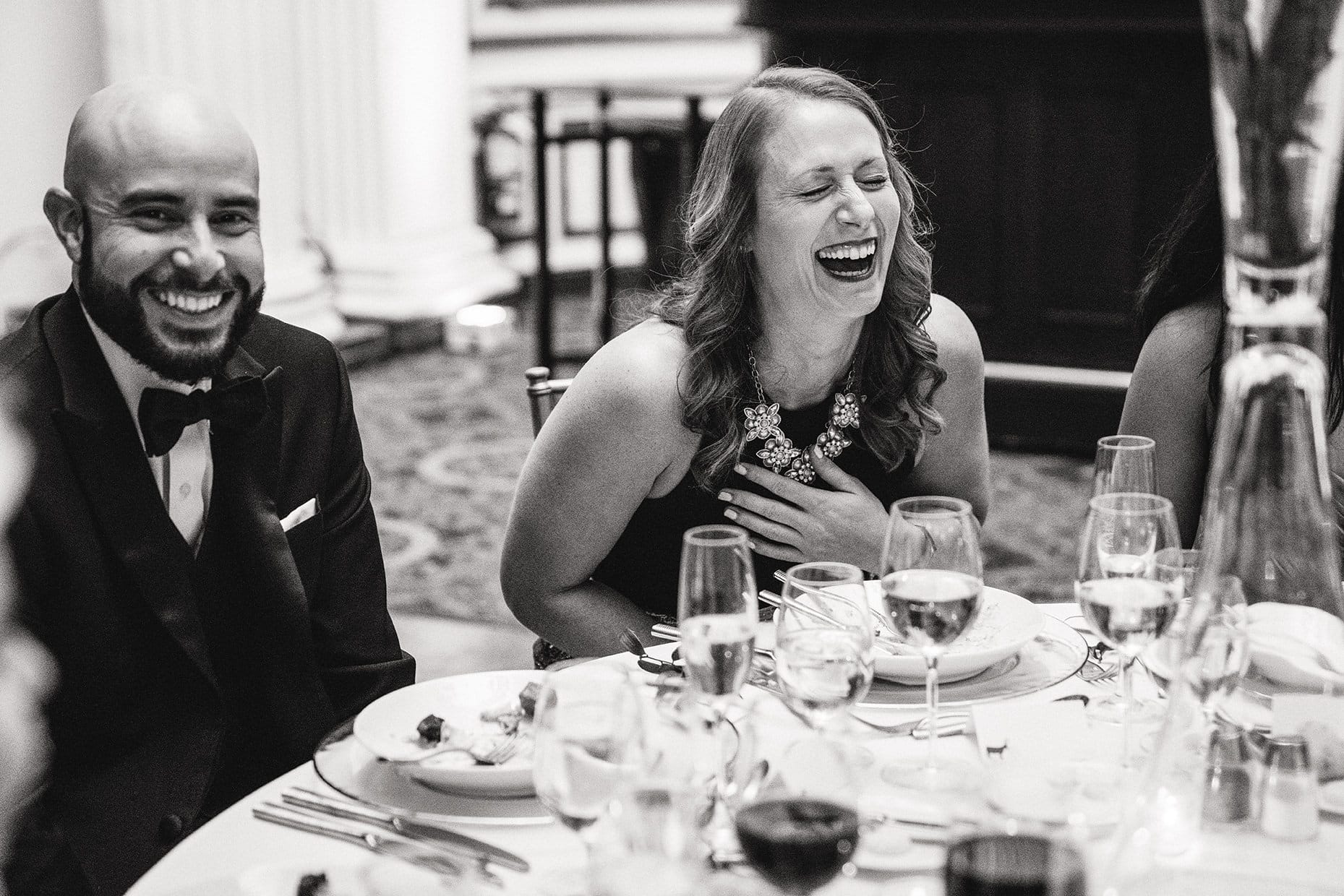 A documentary photograph of the funny and warm toasts at a fairmont copley wedding