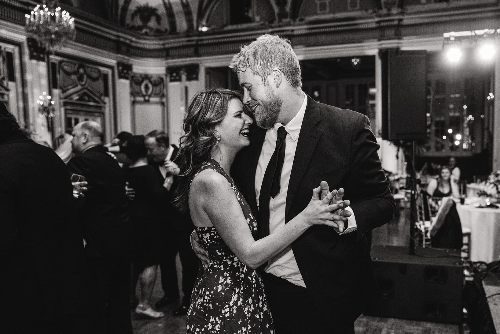 A documentary photograph of guests dancing at a fairmont copley wedding