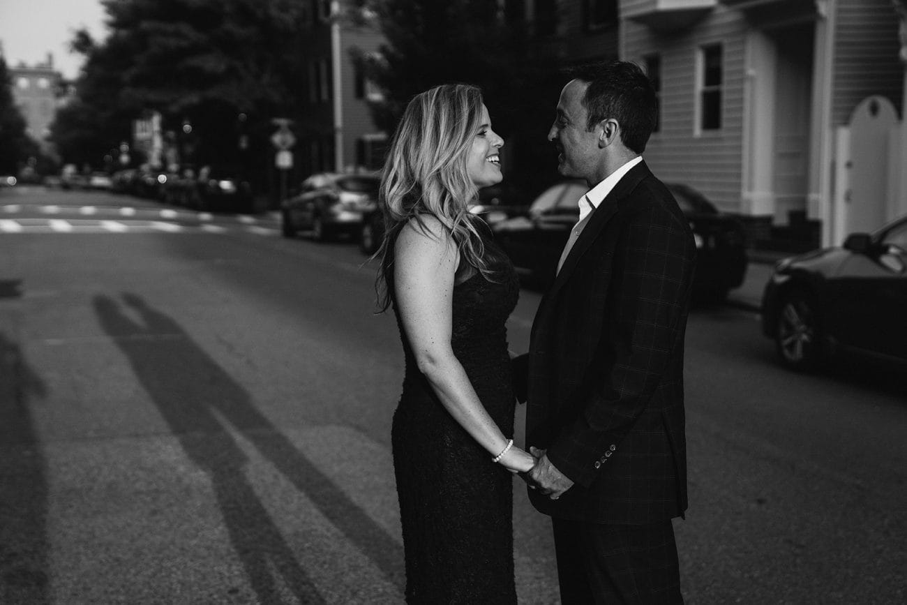 A documentary photograph of a couple during their Charlestown engagement session in Boston