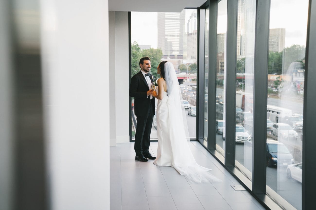 A best of Boston wedding photograph of couple spending a moment together after their Commonwealth Hotel wedding ceremony