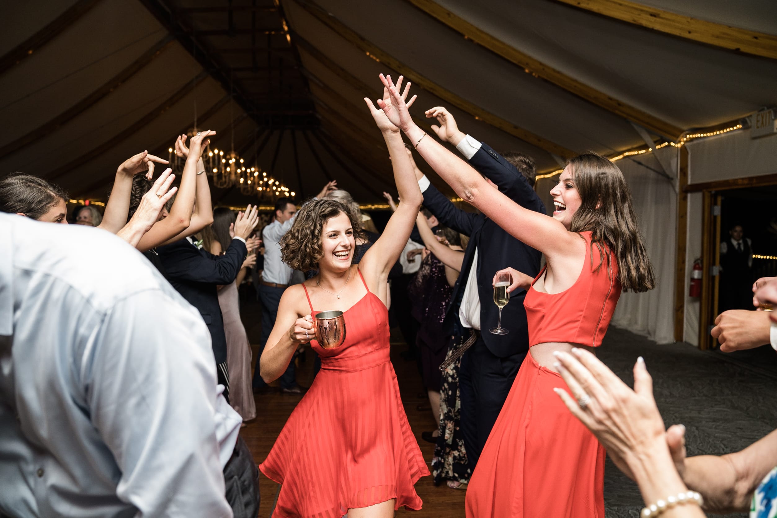 A best of Boston wedding dancing photograph of guests dancing during a Castle Hill Inn Wedding reception
